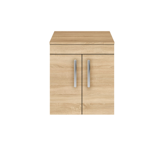 The Nuie Athena Wall Hung 500mm Two Door Vanity with Worktop 500mm is a stunning addition to any bathroom. Its natural oak finish brings a touch of nature and calmness to the space, creating a soothing atmosphere.