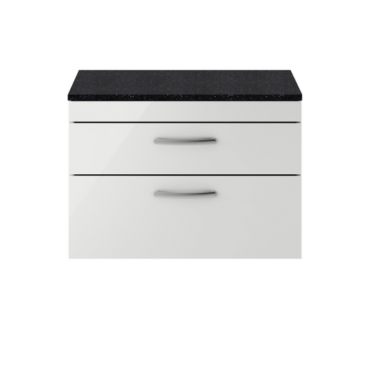 The Nuie Athena Wall Hung 800mm Two Drawer Vanity with Sparkling Black Worktop is a stunning addition to any bathroom. The Gloss Grey Mist unit adds a cool and contemporary style, instantly elevating the overall look of the space. Not only does this wall hung unit create the illusion of a bigger bathroom, but it also offers a practical storage solution with its two soft close drawers. 