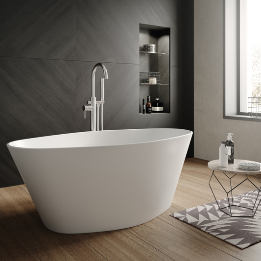 The Hudson Reed Rose Cian Solid Surface White Freestanding Bath is a truly remarkable addition to any bathroom. Its oval shape and striking design create a captivating focal point that instantly elevates the overall aesthetic.